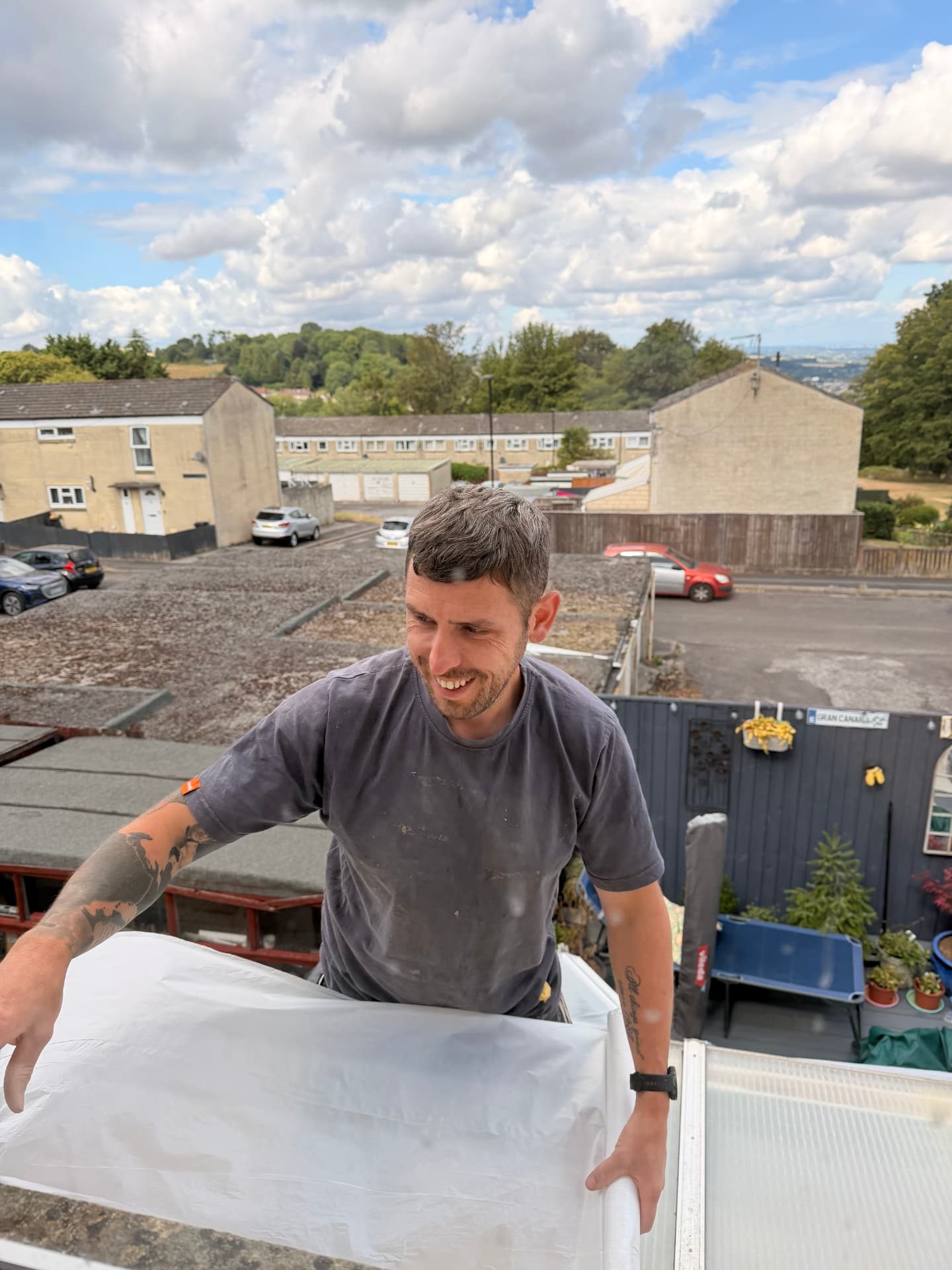 DSB team member on site above the rooftops in Bath